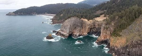 The nutrient-rich Pacific Ocean washes against the dramatic, rocky shoreline of Oregon, not far west of Portland