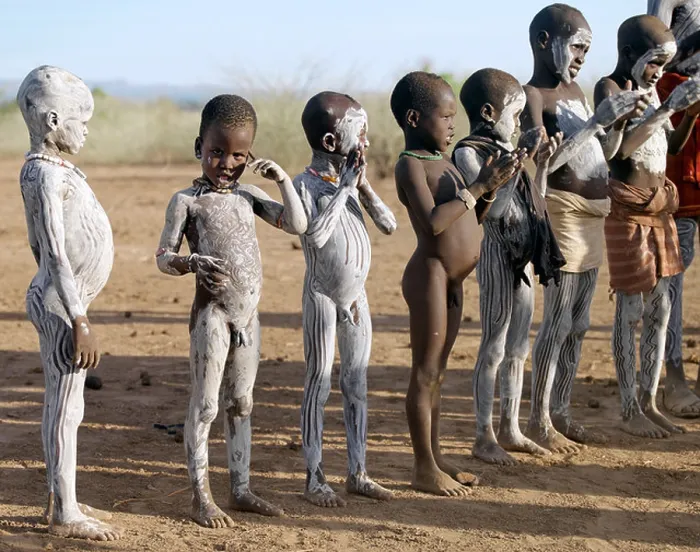 Framed Print : Nyag'atom boys enjoy participating in a dance in the late afternoon.The Nyag'atom are one of the largest tribes Framed Print : Nyag'atom boys enjoy participating in a dance in the late afternoon.The Nyag'atom are one of the largest tribes