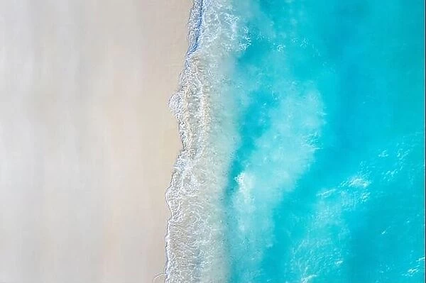 Ocean beach, beautiful landscape, travel and vacation. Aerial view of sandy beach and ocean with waves. Tropical landscape, paradise