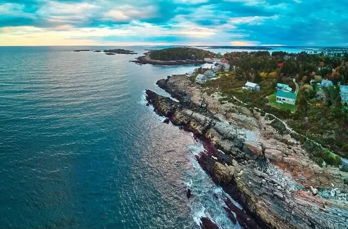 Framed Print : Ocean and rocky coast of Maine aerial with houses and trails Framed Print : Ocean and rocky coast of Maine aerial with houses and trails