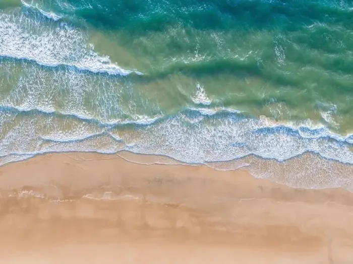 Framed Print : Ocean waves on the beach as a background
