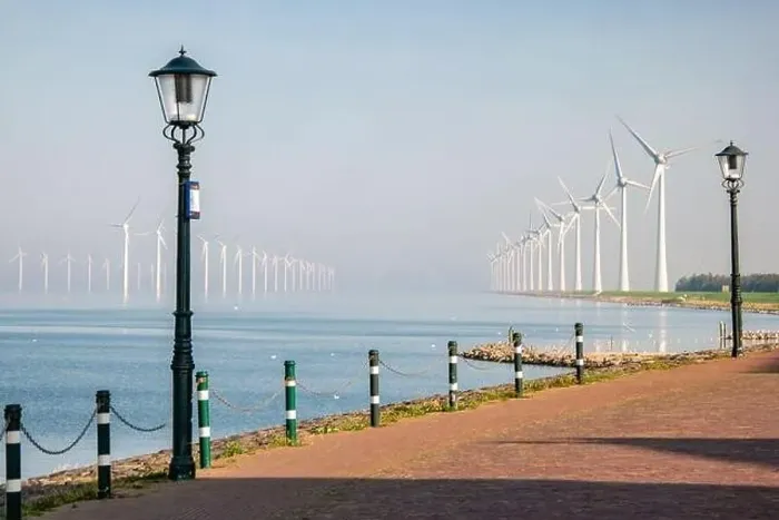 Framed Print : offshore windmill park with clouds and a blue sky, windmill park in the ocean drone aerial view with wind turbine Framed Print : offshore windmill park with clouds and a blue sky, windmill park in the ocean drone aerial view with wind turbine