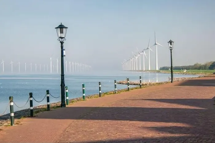 Framed Print : offshore windmill park with clouds and a blue sky, windmill park in the ocean drone aerial view with wind turbine Framed Print : offshore windmill park with clouds and a blue sky, windmill park in the ocean drone aerial view with wind turbine