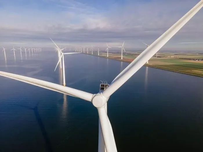 Framed Print : offshore windmill park with clouds and a blue sky, windmill park in the ocean drone aerial view with wind turbine Framed Print : offshore windmill park with clouds and a blue sky, windmill park in the ocean drone aerial view with wind turbine