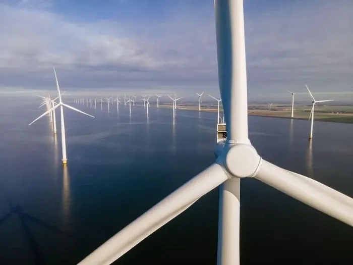 Framed Print : offshore windmill park with clouds and a blue sky, windmill park in the ocean drone aerial view with wind turbine Framed Print : offshore windmill park with clouds and a blue sky, windmill park in the ocean drone aerial view with wind turbine