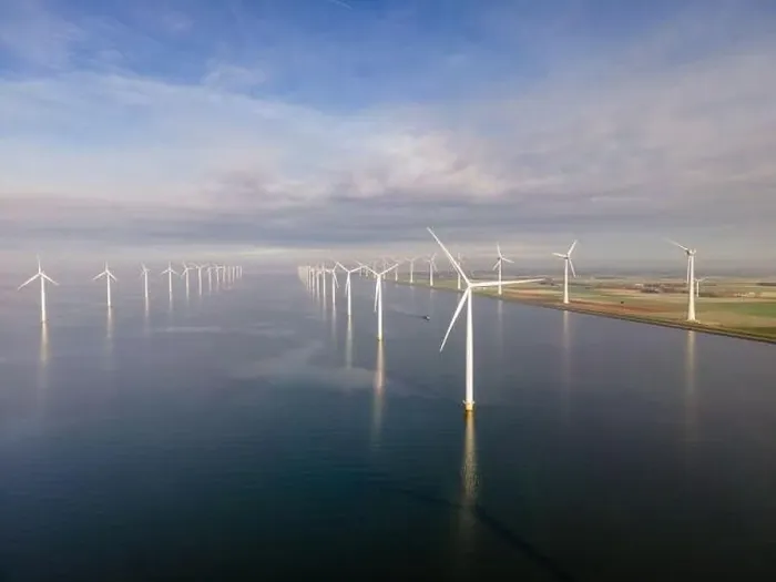 Framed Print : offshore windmill park with clouds and a blue sky, windmill park in the ocean drone aerial view with wind turbine Framed Print : offshore windmill park with clouds and a blue sky, windmill park in the ocean drone aerial view with wind turbine