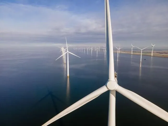 Framed Print : offshore windmill park with clouds and a blue sky, windmill park in the ocean drone aerial view with wind turbine Framed Print : offshore windmill park with clouds and a blue sky, windmill park in the ocean drone aerial view with wind turbine