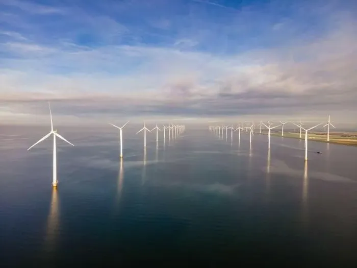 Framed Print : offshore windmill park with clouds and a blue sky, windmill park in the ocean drone aerial view with wind turbine Framed Print : offshore windmill park with clouds and a blue sky, windmill park in the ocean drone aerial view with wind turbine