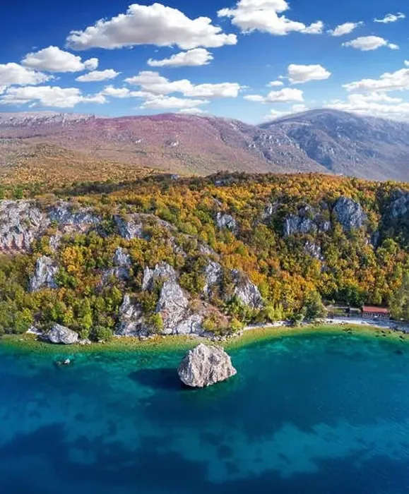 Framed Print : Ohrid Lake and Tarpeica little city in Macedonia with big rock in the lake - drone photography