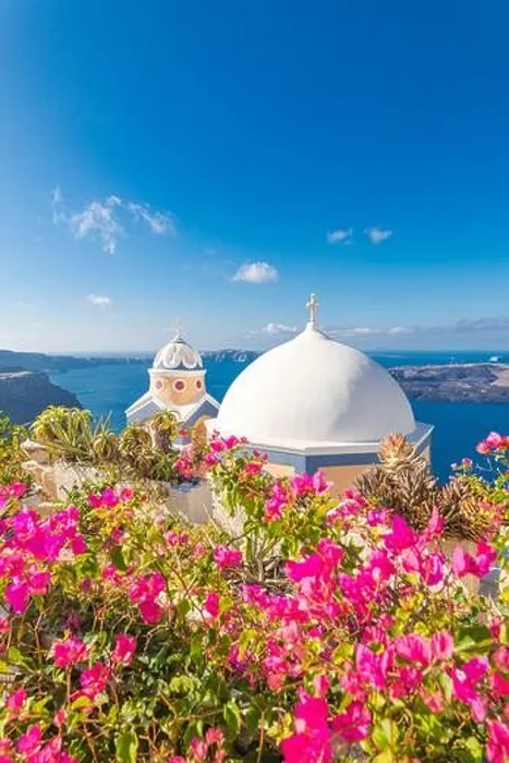 Framed Print : Oia town on Santorini island, Greece. Traditional famous white blue houses with flowers under sunny weather caldera, Aegean sea. Beautiful summer view Framed Print : Oia town on Santorini island, Greece. Traditional famous white blue houses with flowers under sunny weather caldera, Aegean sea. Beautiful summer view