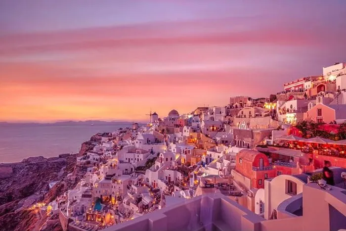 Framed Print : Oia village at night, Santorini island. Famous travel landscape, luxury vacation destination scenic. Beautiful view of fabulous picturesque village Framed Print : Oia village at night, Santorini island. Famous travel landscape, luxury vacation destination scenic. Beautiful view of fabulous picturesque village