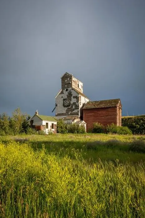Framed Print : Old abandoned grain elevator in the badlands ghost town of Sharples, Alberta Framed Print : Old abandoned grain elevator in the badlands ghost town of Sharples, Alberta