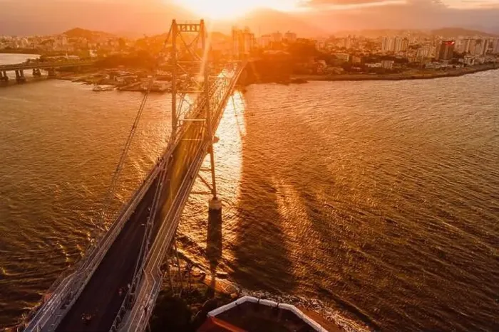 Framed Print : Old cable bridge with sunset light in Florianopolis. Drone view Framed Print : Old cable bridge with sunset light in Florianopolis. Drone view