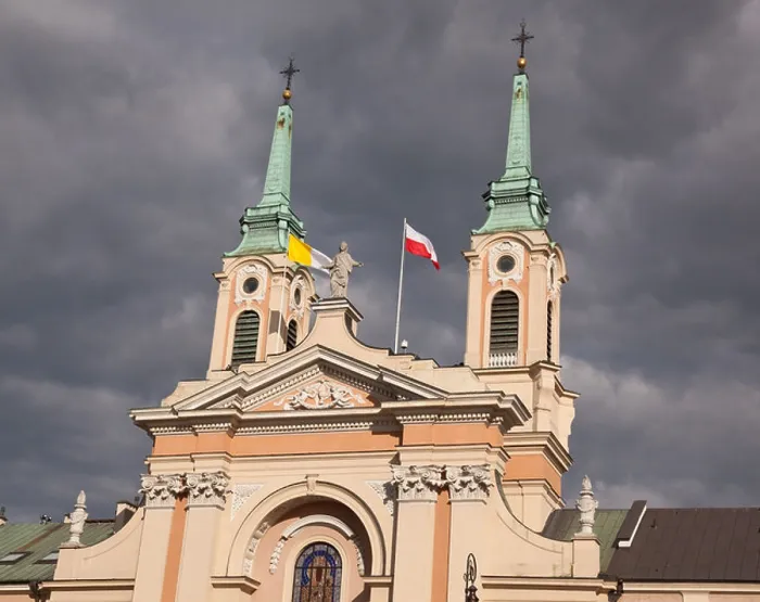 Framed Print : Old church with polish flags in Warsaw Poland Framed Print : Old church with polish flags in Warsaw Poland