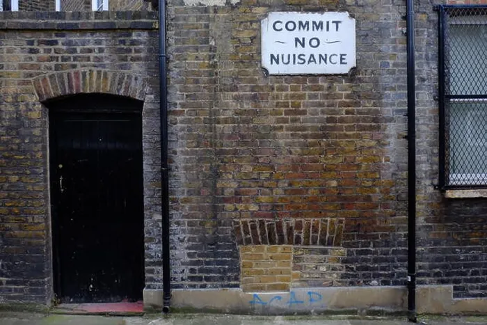 Framed Print : An old Dickensian Commit No Nuisance sign in Southwark, London Framed Print : An old Dickensian Commit No Nuisance sign in Southwark, London