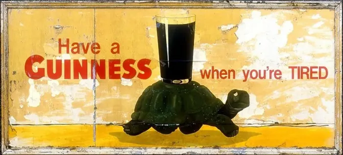 Framed Print : An old guinness poster featuring a tortoise carrying a pint Have a Guinness when you re tired Framed Print : An old guinness poster featuring a tortoise carrying a pint Have a Guinness when you re tired
