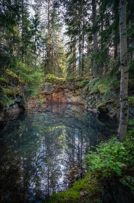 Framed Print : Old and historical mine full with greenish jade color water in middle of forest. This mine is over 500 hundred years old Framed Print : Old and historical mine full with greenish jade color water in middle of forest. This mine is over 500 hundred years old