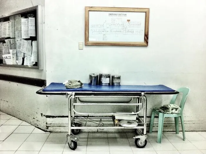 Framed Print : Old hospital bed on wheels in the hallway of the hospital in the Philippines