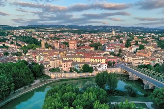 Framed Print : Old italian city Umbertide near Tevere river with cloudy sky and sunset light Framed Print : Old italian city Umbertide near Tevere river with cloudy sky and sunset light