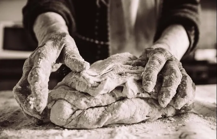 Framed Print : old italian grandma making pasta in the kitchen sepia effect Framed Print : old italian grandma making pasta in the kitchen sepia effect
