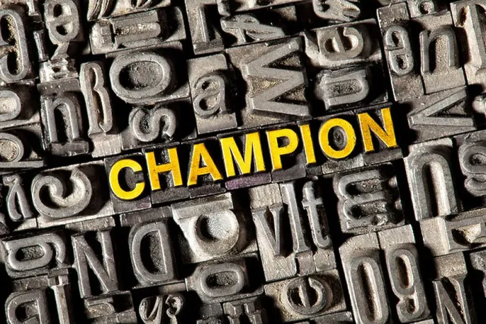 Framed Print : Old lead letters forming the word champion Framed Print : Old lead letters forming the word champion