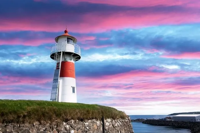 Framed Print : Old lighthouse outside Torshavn city against incredible purple sunset sky, Streymoy island, Faroe Islands, Denmark Framed Print : Old lighthouse outside Torshavn city against incredible purple sunset sky, Streymoy island, Faroe Islands, Denmark