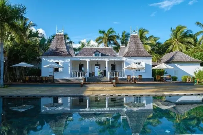 Framed Print : Old planttation house with swimming pool and beach chairs by the ocean, drone aerial view of historical plantation house Framed Print : Old planttation house with swimming pool and beach chairs by the ocean, drone aerial view of historical plantation house
