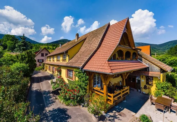 Framed Print : Old but renovated village house in countryside aerial view, Alsace, France Framed Print : Old but renovated village house in countryside aerial view, Alsace, France