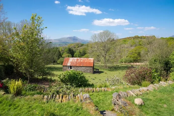 Framed Print : Old stone barn in the hills of Snowdonia with views of the mountains beyond. A sunny day in early summer Framed Print : Old stone barn in the hills of Snowdonia with views of the mountains beyond. A sunny day in early summer