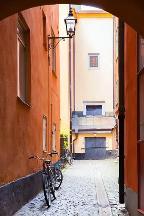 Framed Print : Old street in Gamla Stan district in Stockholm, Sweden. Shallow DOF! Focus on the bicycle by the wall Framed Print : Old street in Gamla Stan district in Stockholm, Sweden. Shallow DOF! Focus on the bicycle by the wall