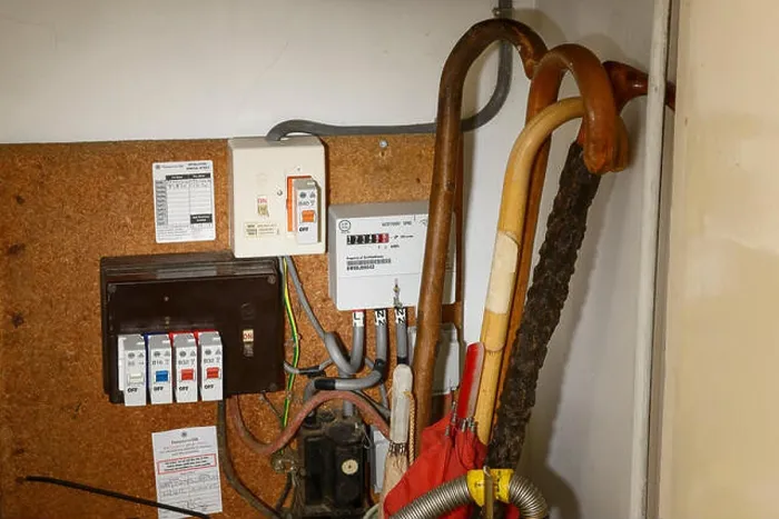 Framed Print : An old style electricity meter with fuses in a cupboard Framed Print : An old style electricity meter with fuses in a cupboard
