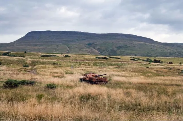 Framed Print : An old tank lies derelict on the Warcop army firing range, Cumbria, UK Framed Print : An old tank lies derelict on the Warcop army firing range, Cumbria, UK