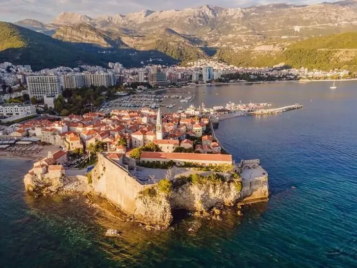 Framed Print : Old town in Budva in a beautiful summer day, Montenegro. Aerial image. Top view Framed Print : Old town in Budva in a beautiful summer day, Montenegro. Aerial image. Top view