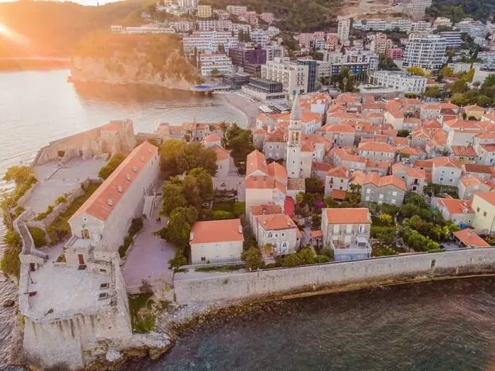 Framed Print : Old town in Budva in a beautiful summer day, Montenegro. Aerial image. Top view Framed Print : Old town in Budva in a beautiful summer day, Montenegro. Aerial image. Top view