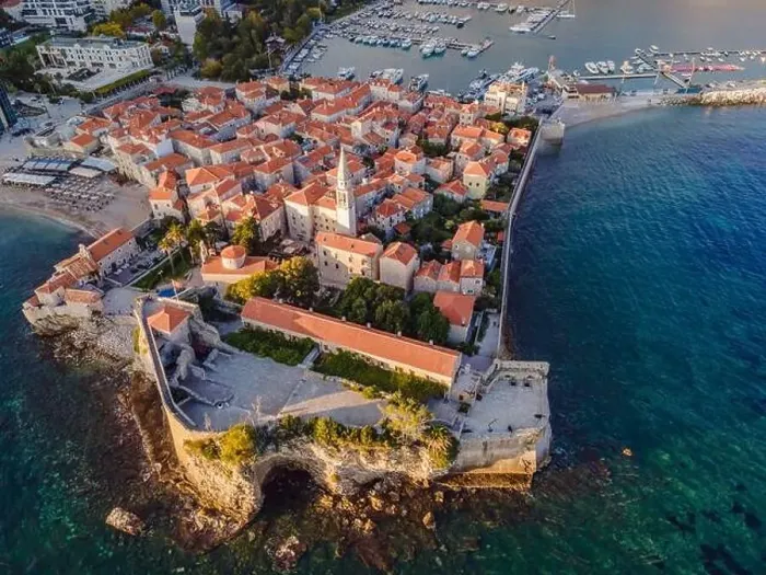Framed Print : Old town in Budva in a beautiful summer day, Montenegro. Aerial image. Top view Framed Print : Old town in Budva in a beautiful summer day, Montenegro. Aerial image. Top view
