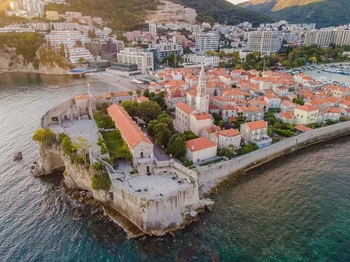 Framed Print : Old town in Budva in a beautiful summer day, Montenegro. Aerial image. Top view Framed Print : Old town in Budva in a beautiful summer day, Montenegro. Aerial image. Top view