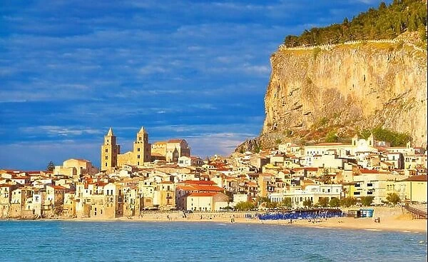 Old town view with cathedral and La Rocca hill, Cefalu, Sicily, Italy