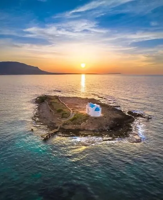 Framed Print : An old white church in a small island at sunset in Malia, Crete, Greece Framed Print : An old white church in a small island at sunset in Malia, Crete, Greece