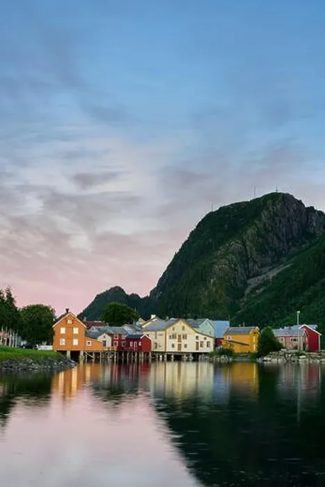 Framed Print : Old wooden houses by the harbor at high tide in Mosjöen, Norway Framed Print : Old wooden houses by the harbor at high tide in Mosjöen, Norway