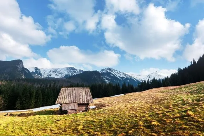 Framed Print : Old wooden hut and cloudy sky in spring High Tatras mountains in Kalatowki meadow, Zakopane, Poland. Landscape photography Framed Print : Old wooden hut and cloudy sky in spring High Tatras mountains in Kalatowki meadow, Zakopane, Poland. Landscape photography