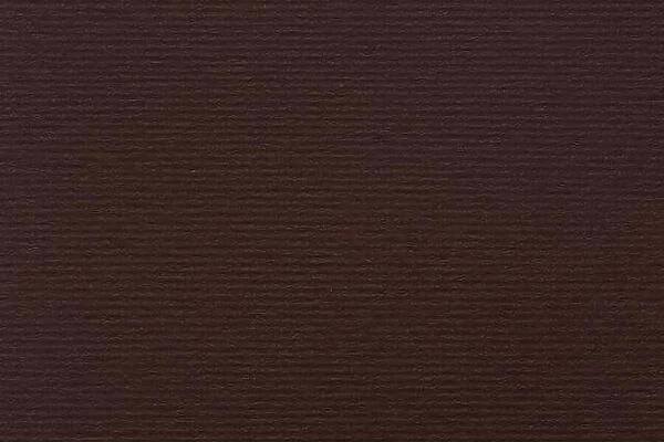 Old and worn brown paper texture background