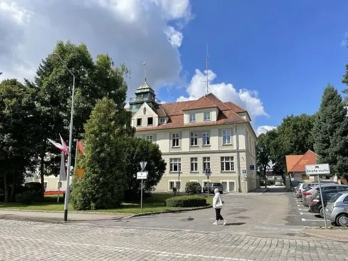 Framed Print : OLESNO, POLAND - Aug 11, 2021: The trail Station and city government office in Olesno, Poland Framed Print : OLESNO, POLAND - Aug 11, 2021: The trail Station and city government office in Olesno, Poland