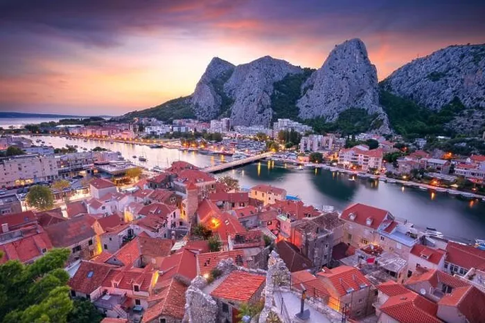 Framed Print : Omis, Croatia. Cityscape image of beautiful coastal town Omis, Dalmatia, Croatia at summer sunset Framed Print : Omis, Croatia. Cityscape image of beautiful coastal town Omis, Dalmatia, Croatia at summer sunset