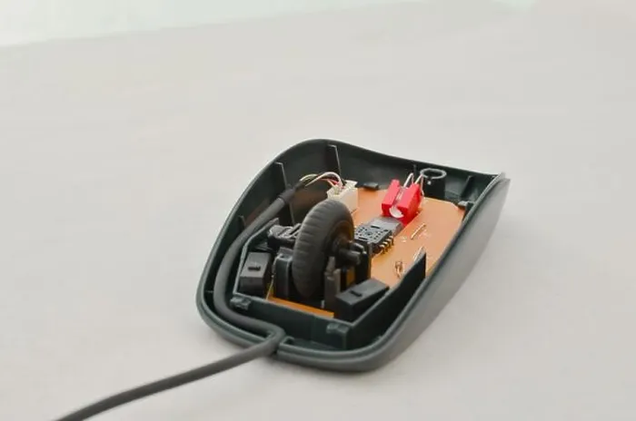 Framed Print : Open computer mouse with exposed electronic circuit for maintenance, symbol of technology and modern computing. Perfect for technology concepts, digit Framed Print : Open computer mouse with exposed electronic circuit for maintenance, symbol of technology and modern computing. Perfect for technology concepts, digit