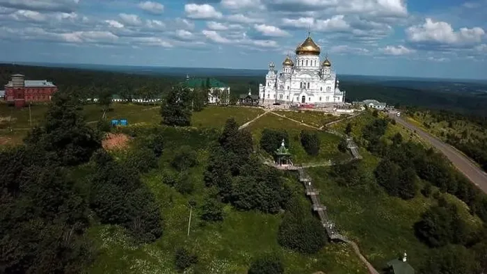Framed Print : Orthodox church of white stone on a green hillock