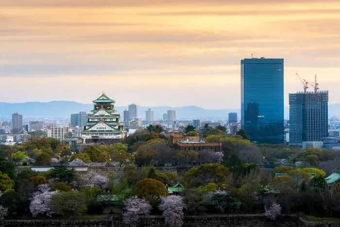 Framed Print : Osaka castle with cherry blossom and Center business district in background at Osaka, Japan Framed Print : Osaka castle with cherry blossom and Center business district in background at Osaka, Japan