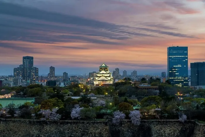 Framed Print : Osaka castle with cherry blossom and center business district in background at Osaka, Japan. Japan spring beautiful scene Framed Print : Osaka castle with cherry blossom and center business district in background at Osaka, Japan. Japan spring beautiful scene