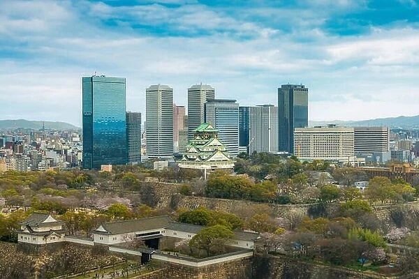 Osaka Castle with Osaka business park financial district in Osaka city, Japan