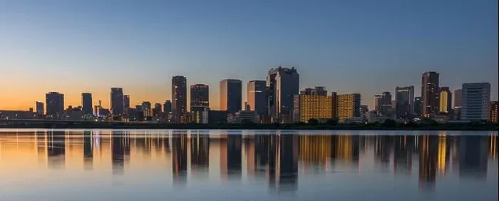 Framed Print : Osaka, Japan skyline at Umeda from across the Yodogawa River in the early morning Framed Print : Osaka, Japan skyline at Umeda from across the Yodogawa River in the early morning