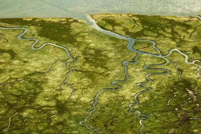 Framed Print : Ostheller- landscape and salt marshes in the Wadden Sea prils Norderney island as part of the East Frisian Islands, aerial view, 27.08.2014, Germany Framed Print : Ostheller- landscape and salt marshes in the Wadden Sea prils Norderney island as part of the East Frisian Islands, aerial view, 27.08.2014, Germany
